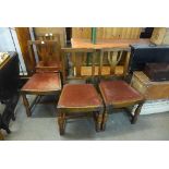 A set of four oak dining chairs
