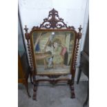 A Victorian rosewood fire screen