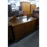 An Art Deco oak mirror-back sideboard