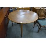 A Danish teak circular dining table