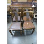 A set of four oak dining chairs