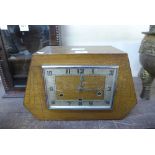 An Art Deco walnut mantel clock