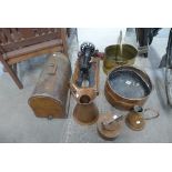 A cased sewing machine, two copper jugs, a copper kettle,