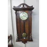 A 19th Century Junghans walnut Vienna wall clock