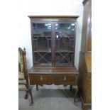 A George III inlaid mahogany bureau bookcase