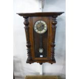 A 19th Century walnut Vienna wall clock