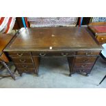 An Edward VII mahogany pedestal desk