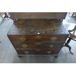 A George III oak chest of drawers