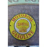 A reproduction cast iron Shell sign