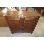 A Jaycee oak cabinet