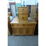 A pine sideboard and bedside chest