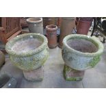 A pair of garden urns