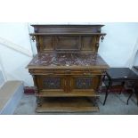 A 19th Century Henry II style walnut and marble topped buffet