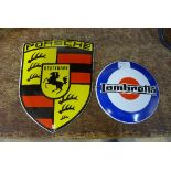Two reproduction enamelled Porsche and Lambretta badges