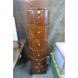 An Art Deco style rosewood effect tall six drawer chest