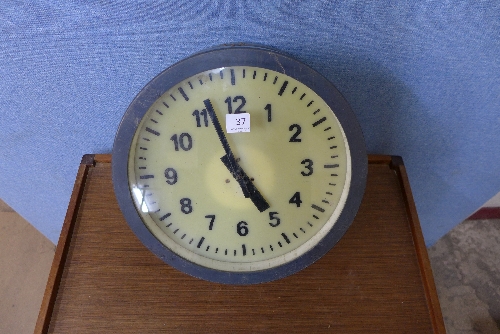 A mid-20th Century continental double sided railway clock