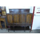 An Edward VII inlaid mahogany cupboard on stand