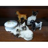 Royal Doulton cats, a Beswick Siamese cat, a Beswick spaniel, a dog and a trinket pot,