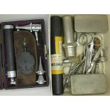 A small case of medical equipment and scissors, etc.