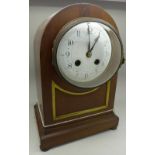 An arch top mantel clock with striking movement, with two keys and pendulum, dial and case a/f,