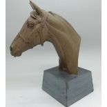 A Doris Lindner bust of a racehorse on a slate plinth