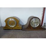 An oak mantel clock and walnut mantel clock