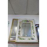 A hand painted floral design framed mirror and a gilt framed mirror