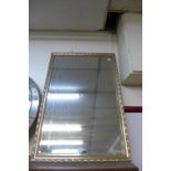 A gilt framed mirror