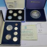 Three boxed coins sets;- a 2oz silver commemorative Charles and Camilla,