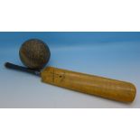 A miniature autographed cricket bat by Gunn & Moore and a cricket ball