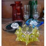 Assorted glassware including a cranberry glass jug,