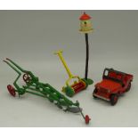 A Dinky Toys Meccano Jeep and push mower, a Britains Farm Plough and dovecote,