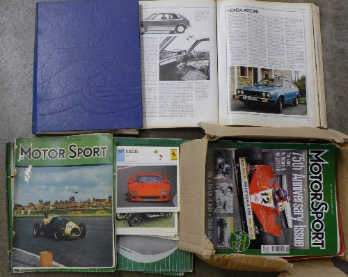 Ten volumes of On Four Wheels magazine and a box of car related books