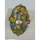 A 9ct gold and multi-coloured gem set ring, 5.