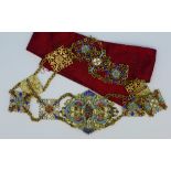 A gilt and enamel belt,