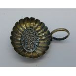 A Georgian white metal filigree caddy spoon,