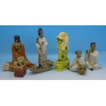 Four Chinese figures, a junk, a small soapstone carving and a resin figure of a Temple lion,