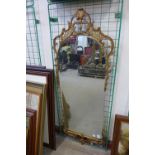 A gilt framed mirror