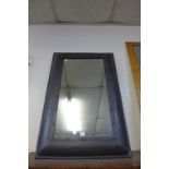 A metal framed mirror