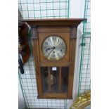 A George V oak Westminster chime wall clock