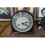 An Enfield Bakelite clock with striking movement (with key)