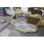 A gilt framed mirror