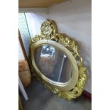 A reproduction French Louis XV style gilt framed mirror