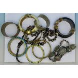 Eastern bracelets, a hardstone set belt, etc.