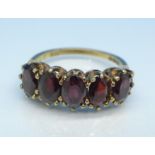 A 9ct gold and garnet ring, 2.