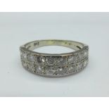 An 18ct white gold double row diamond ring, approximately 1.25 carats, 4.