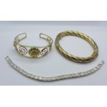 A silver gilt bangle and a silver bracelet,