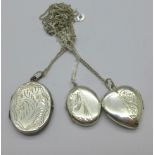 Three silver lockets and chains