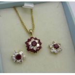 A pair of cluster earrings and matching pendant on a 9ct gold chain,