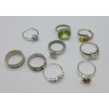 Nine silver and white metal rings